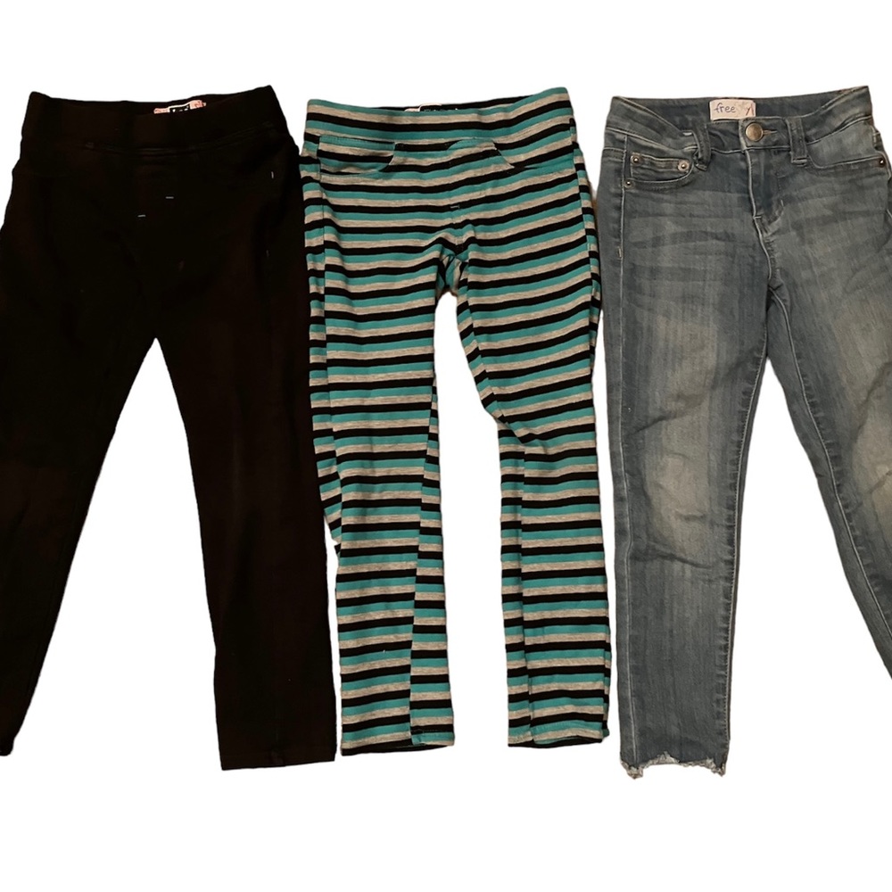 Three pair of pants. Two pair of Lee’s stretch pants with faux pockets & zipper